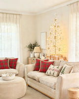 Liz light-filtering linen curtains serving as an elegant backdrop for a festive Christmas tree in a living room.