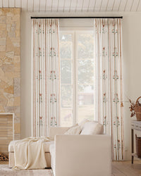Elegant Lily floral drapes with a 2 inch bottom hem showing a luxury puddle length