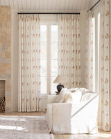 Elegant floral drapes with puddle length following traditional drapery trends 2026