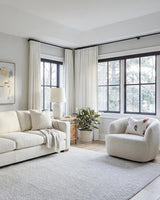 Full view of the Luma premium herringbone curtain panel showing its elegant drape and pinch pleat header.