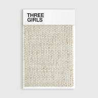 A fabric swatch for the Clara linen curtain in a two-toned beige and cream, showcasing its thick, textured basket-weave