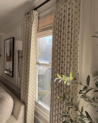 Thermal curtains with 70% light blocking efficiency shown on a sunny window for energy-saving climate control.