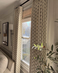 Thermal curtains with 70% light blocking efficiency shown on a sunny window for energy-saving climate control.