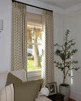 Refined bedroom drapes in a ditsy floral print designed for superior privacy and a tailored aesthetic.