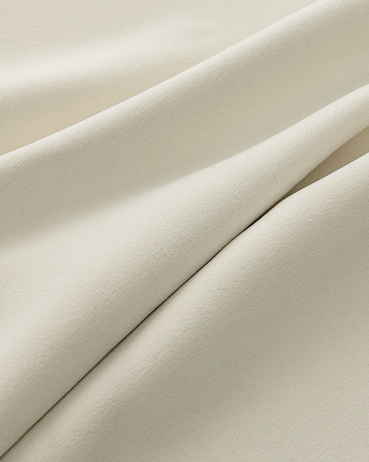 A close-up shot of the soft, 500gsm Sand Chenille fabric, highlighting its thick and high-density woven texture.